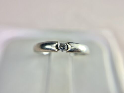 14k White Gold Round Brilliant Diamond Tension Set Solitaire Engagement Ring