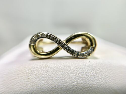 10k Yellow Gold Designer Round Diamond Infinity Symbol Ring