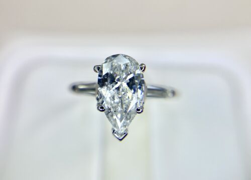 Art Deco Platinum Natural Pear Shape Baguette Cut Diamond Engagement Ring