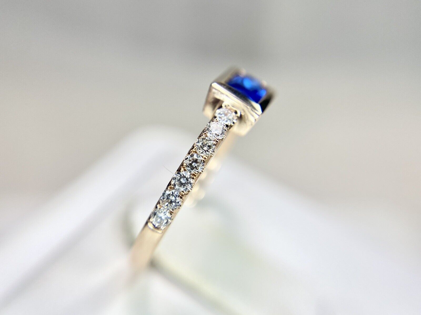 14k Rose Gold Emerald Cut Blue Sapphire Round Diamond Bezel Set Ring