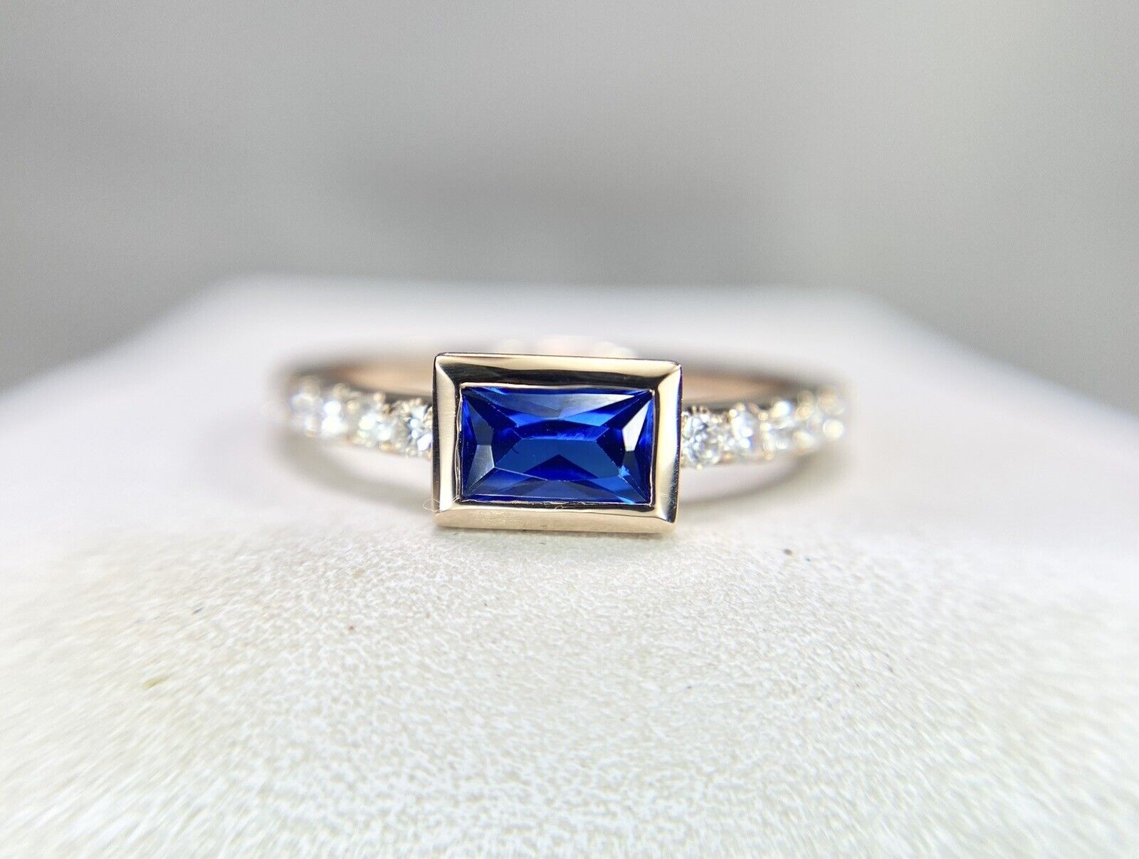 14k Rose Gold Emerald Cut Blue Sapphire Round Diamond Bezel Set Ring